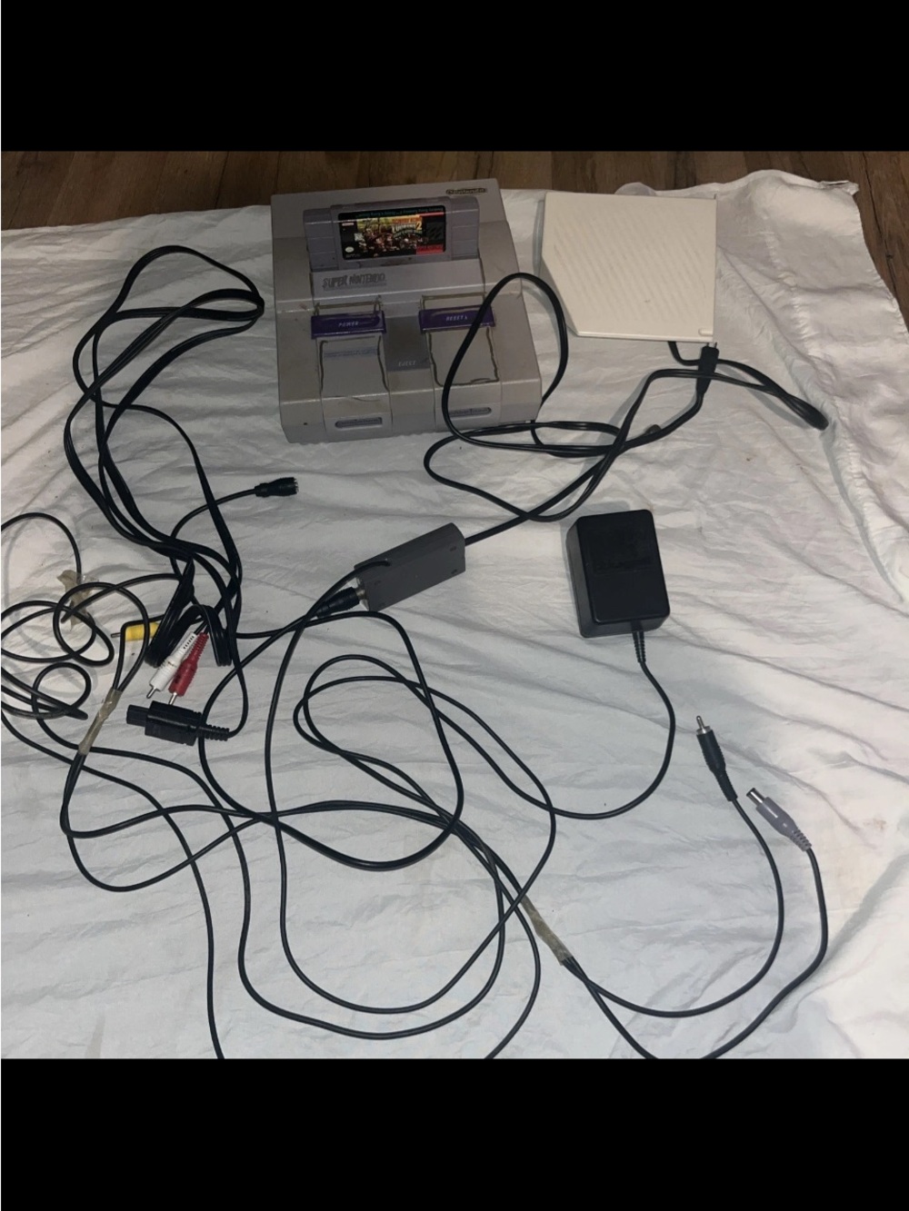 Nintendo SNES Classic Gray Console with Purple Switch Accents and Black Cables